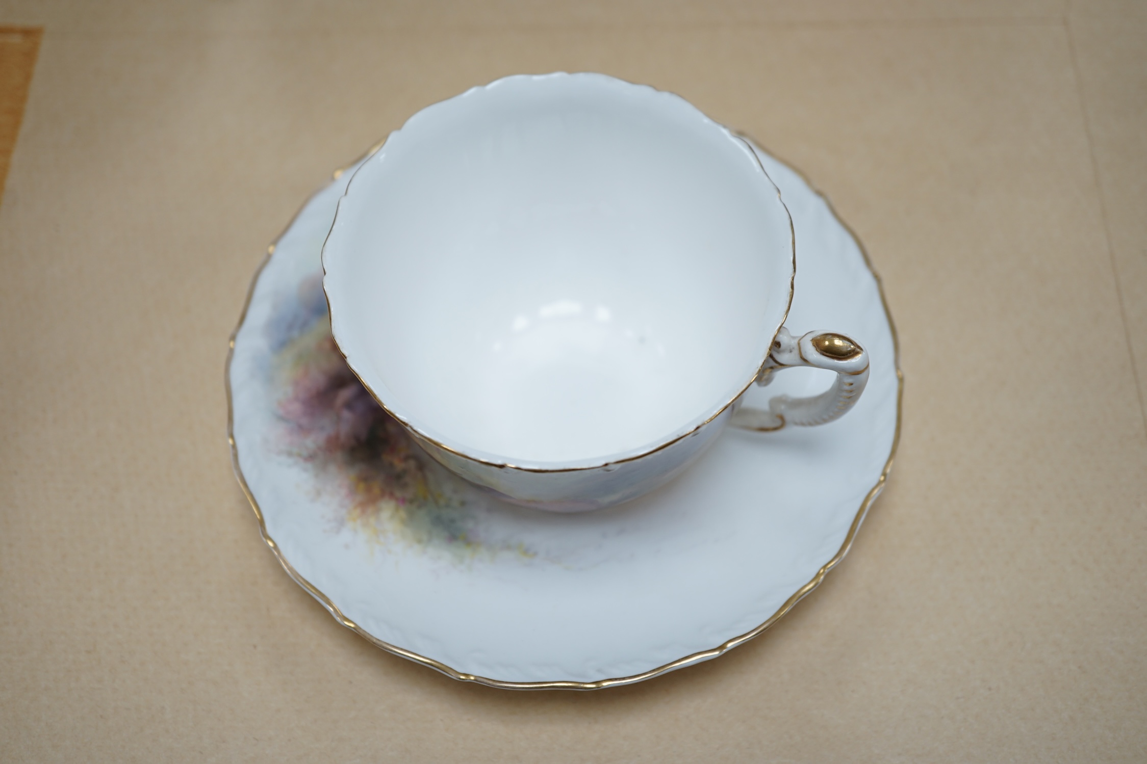 A Royal Worcester Harry Stinton Highland cattle painted cup and saucer, saucer 13cm diameter. Condition - good